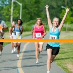 Female runner finish line